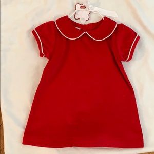 Infant red corduroy dress.